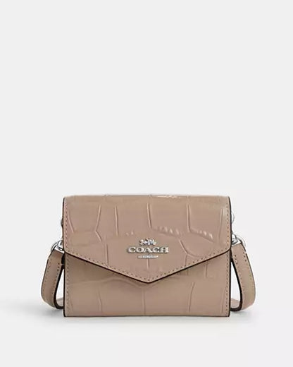 Coach mini envelope wallet with strap