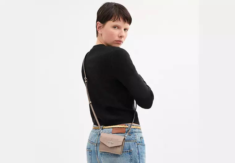 Coach mini envelope wallet with strap
